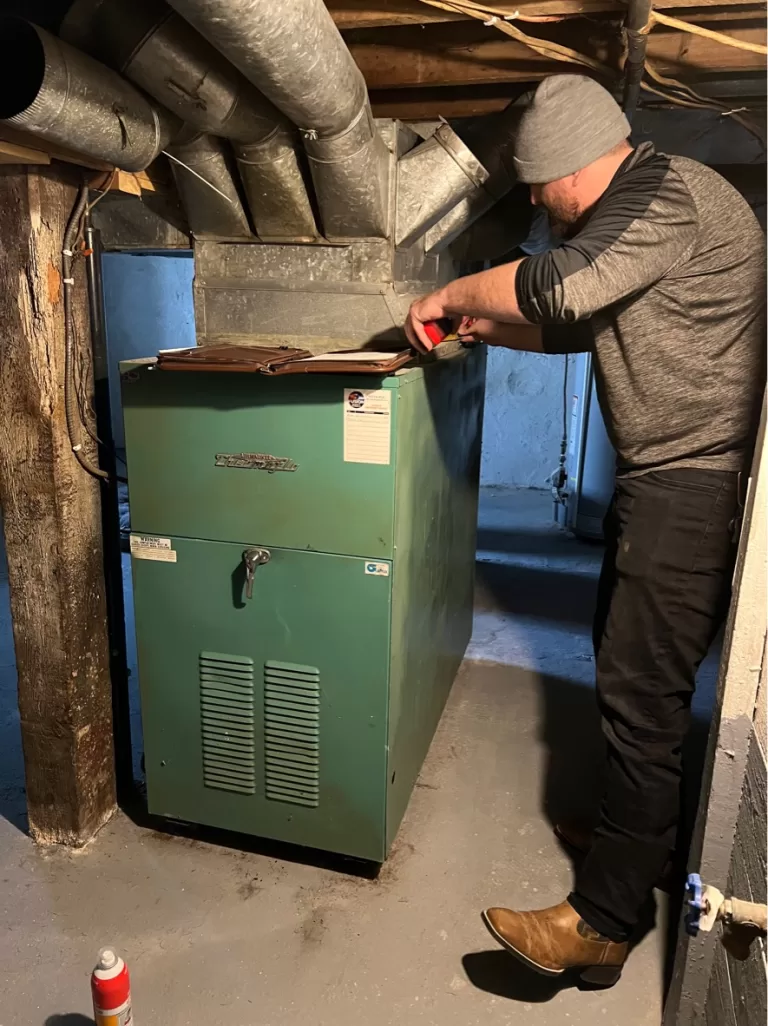 ALCIVIA Heating and cooling HVAC team member gives an estimate on furnace replacement